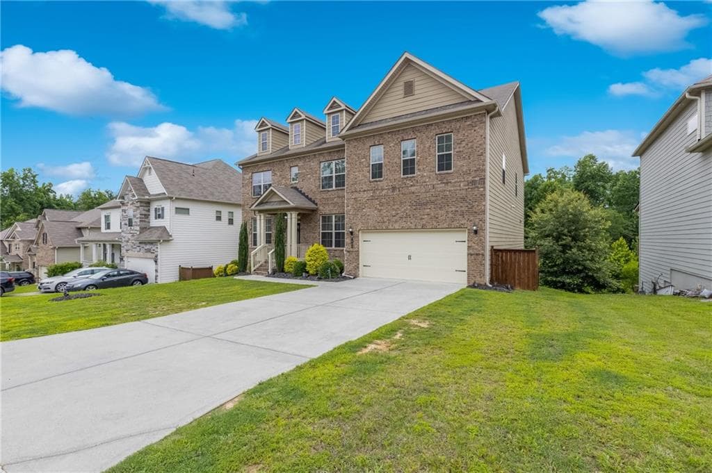5 bedroom, 4 bathroom, 3,999 sq ft single family residence for sale at 7905 Brewton Creek Drive, Cumming, GA 30028 — photo 2