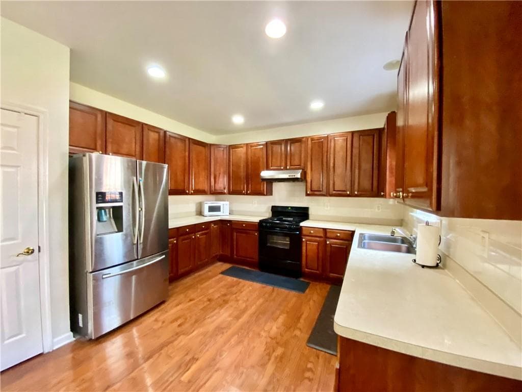 4 bedroom, 3 bathroom, 2,577 sq ft single family residence for sale at 1113 Overview Drive, Lawrenceville, GA 30044 — photo 8