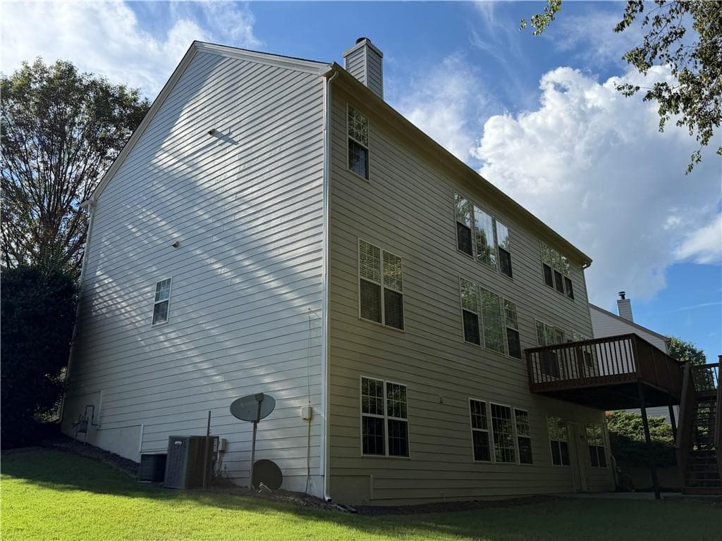 5 bedroom, 3 bathroom, 2,734 sq ft single family residence for sale at 555 Midhurst Place, Johns Creek, GA 30024 — photo 3
