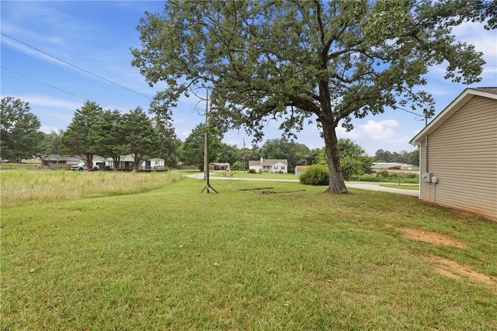 3 bedroom, 2 bathroom, 1,218 sq ft single family residence for sale at 6214 Helen Street, Lula, GA 30554 — photo 7