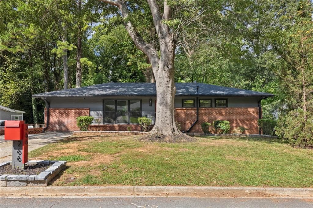 5 bedroom, 4 bathroom, 2,538 sq ft single family residence for sale at 266 Simon Terrace, Atlanta, GA 30318 — photo 1 of 37