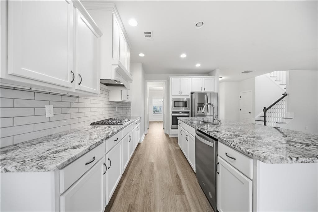 4 bedroom, 3 bathroom, 2,325 sq ft single family residence for sale at 1705 Orileys Run, Winder, GA 30680 — photo 3