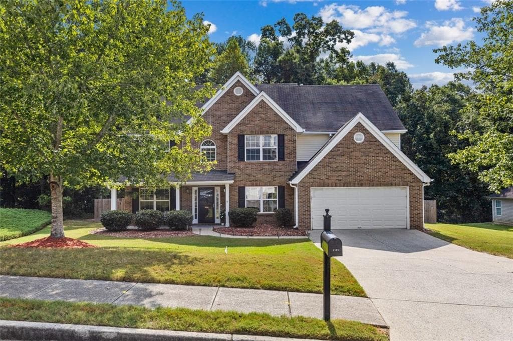 4 bedroom, 3 bathroom, 2,652 sq ft single family residence for sale at 1138 Mitford Lane, Dacula, GA 30019 — photo 2
