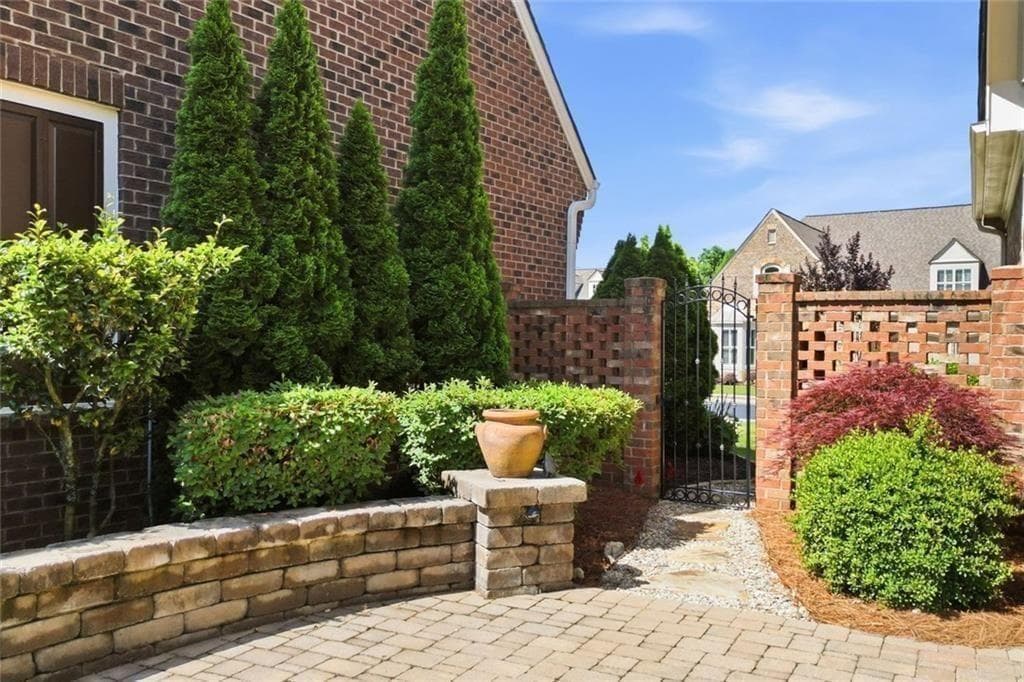 3 bedroom, 4 bathroom, 3,460 sq ft single family residence for sale at 318 Lakeside Trace, Canton, GA 30115 — photo 2