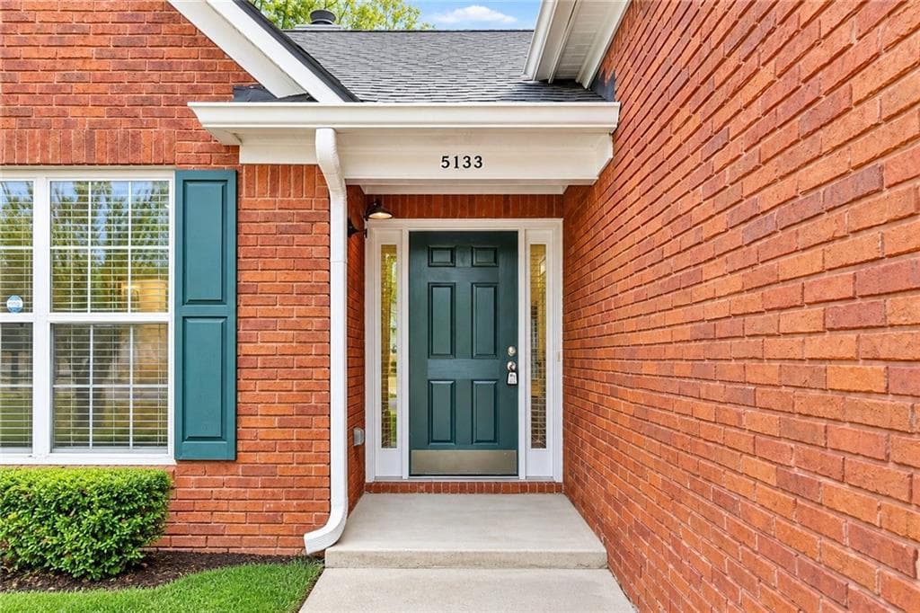 4 bedroom, 2 bathroom, 2,400 sq ft single family residence for sale at 5133 Haverford Run Drive, Lilburn, GA 30047 — photo 2