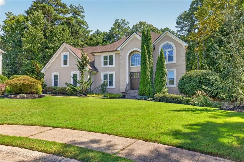 7 bedroom, 5 bathroom, 5,968 sq ft single family residence for sale at 4490 Barony Drive, Suwanee, GA 30024 — photo 2