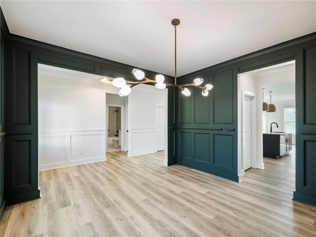 5 bedroom, 4 bathroom, 3,243 sq ft single family residence for sale at 4260 Hosch Reserve Drive, Buford, GA 30519 — photo 4