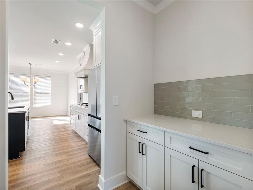 5 bedroom, 4 bathroom, 3,243 sq ft single family residence for sale at 4260 Hosch Reserve Drive, Buford, GA 30519 — photo 5