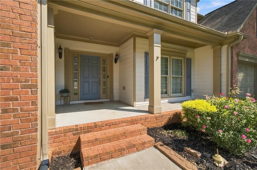 5 bedroom, 5 bathroom, 4,822 sq ft single family residence for sale at 7455 Bronson Way, Cumming, GA 30041 — photo 2