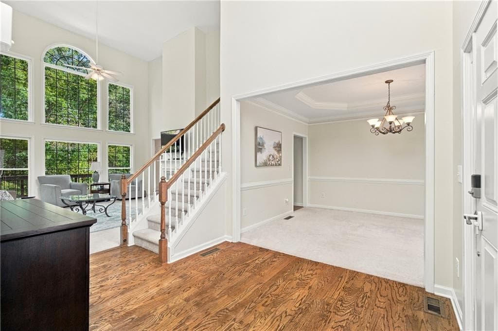 5 bedroom, 5 bathroom, 4,822 sq ft single family residence for sale at 7455 Bronson Way, Cumming, GA 30041 — photo 4