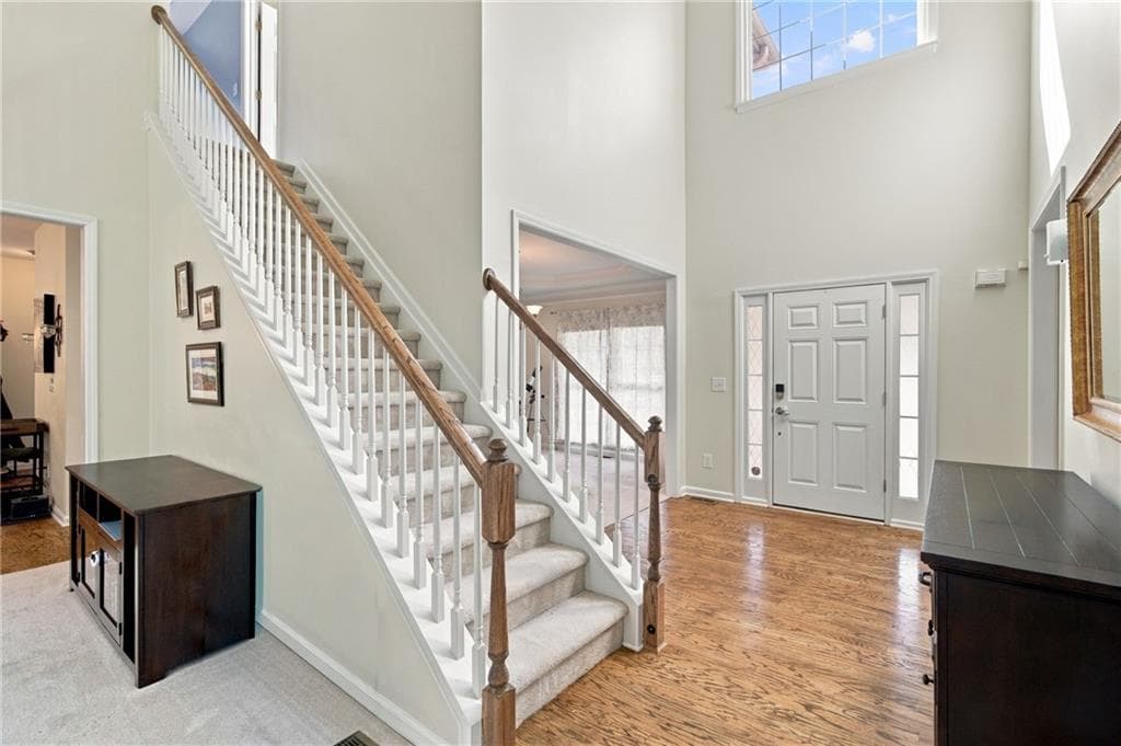 5 bedroom, 5 bathroom, 4,822 sq ft single family residence for sale at 7455 Bronson Way, Cumming, GA 30041 — photo 6