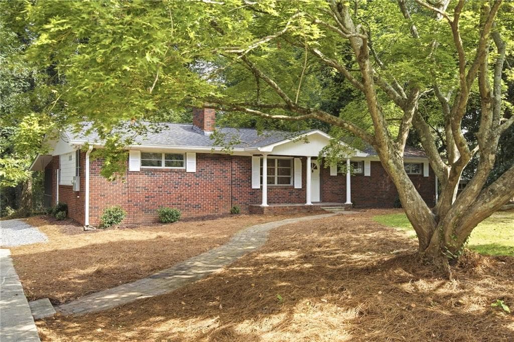 4 bedroom, 3 bathroom, 1,800 sq ft single family residence for sale at 1972 Dobbins Drive, Kennesaw, GA 30144