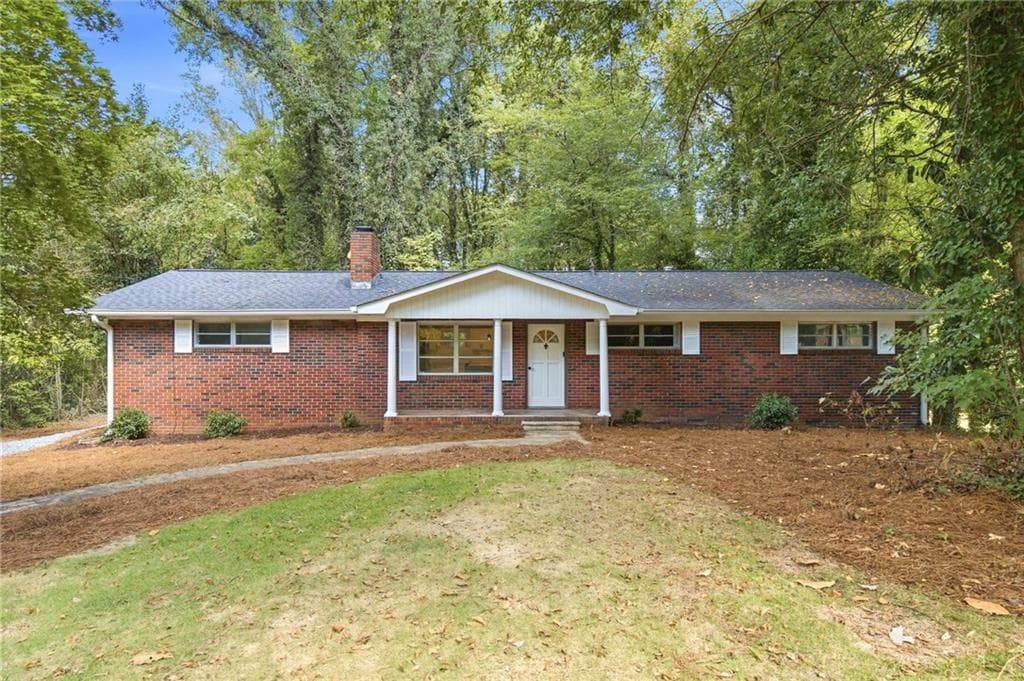 4 bedroom, 3 bathroom, 1,800 sq ft single family residence for sale at 1972 Dobbins Drive, Kennesaw, GA 30144 — photo 2