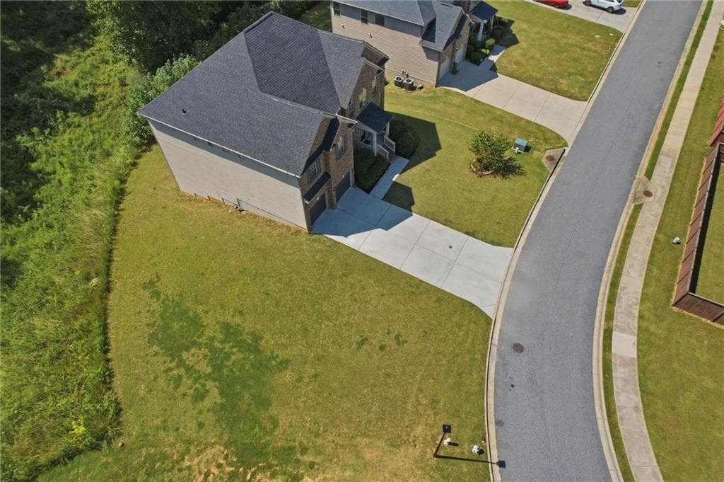 5 bedroom, 4 bathroom, 4,155 sq ft single family residence for sale at 4415 Mossbrook Circle, Alpharetta, GA 30004 — photo 3