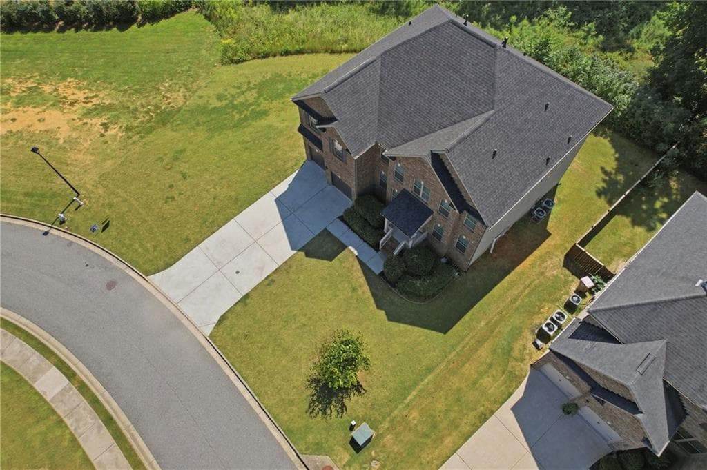 5 bedroom, 4 bathroom, 4,155 sq ft single family residence for sale at 4415 Mossbrook Circle, Alpharetta, GA 30004 — photo 4