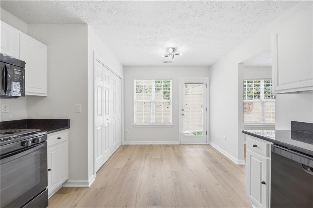 3 bedroom, 3 bathroom, 1,600 sq ft single family residence for sale at 2479 Feathertree Lane, Lawrenceville, GA 30044 — photo 2