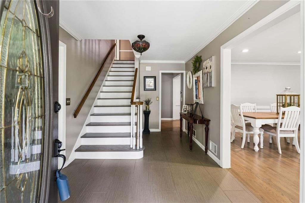 6 bedroom, 5 bathroom, 4,975 sq ft single family residence for sale at 7625 Nesbit Ferry Road, Sandy Springs, GA 30350 — photo 3
