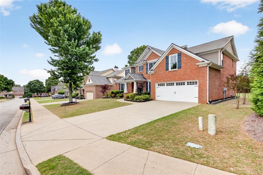4 bedroom, 3 bathroom, 2,511 sq ft single family residence for sale at 6121 Stillwater Trail, Flowery Branch, GA 30542 — photo 4