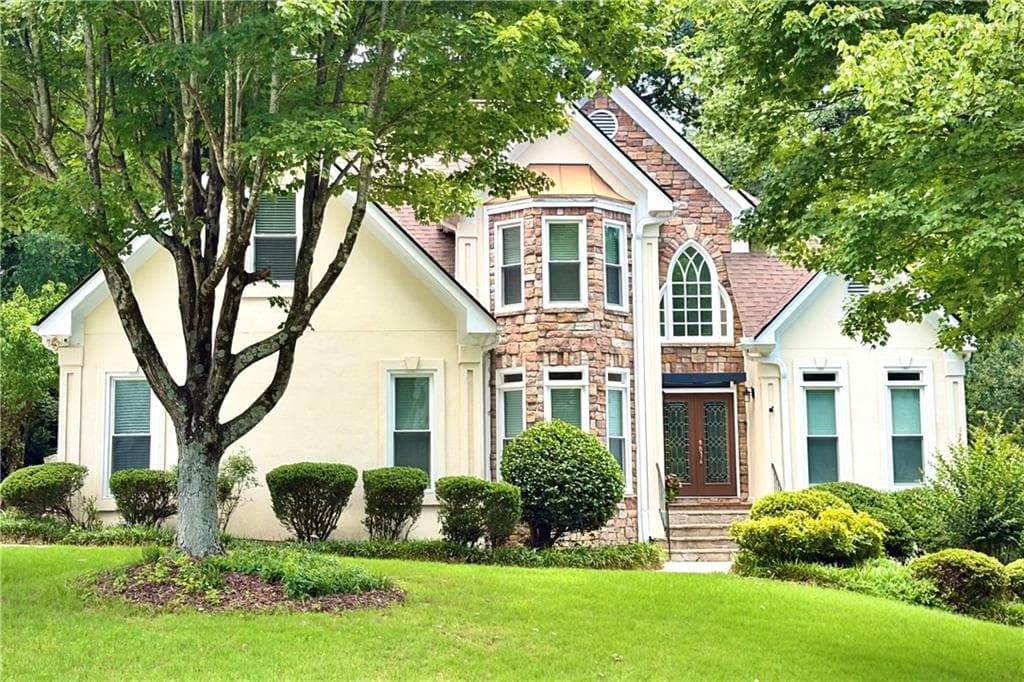5 bedroom, 5 bathroom, 4,640 sq ft single family residence for sale at 1820 Eagle Summit Court, Lawrenceville, GA 30043