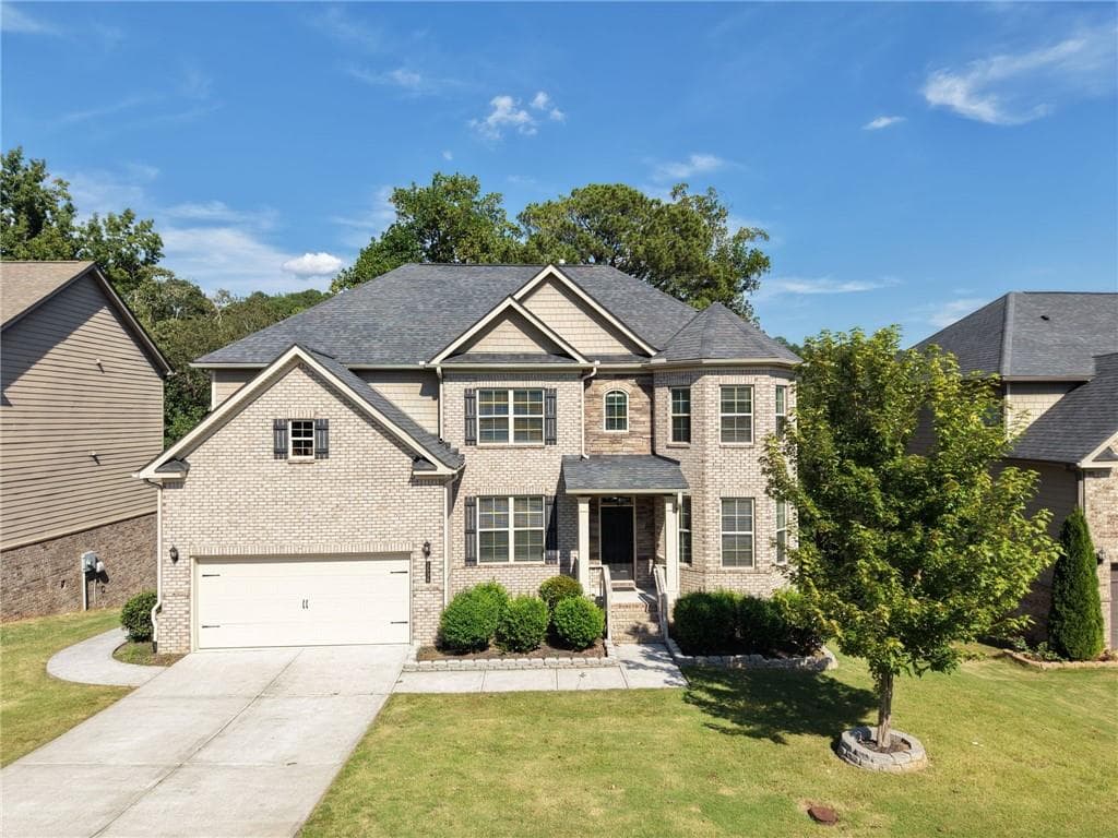 6 bedroom, 5 bathroom, 5,073 sq ft single family residence for sale at 1530 Dahlia Drive, Cumming, GA 30040 — photo 2