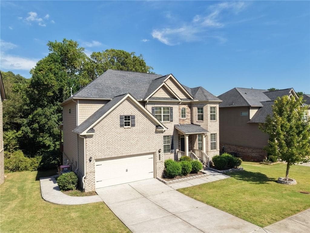 6 bedroom, 5 bathroom, 5,073 sq ft single family residence for sale at 1530 Dahlia Drive, Cumming, GA 30040 — photo 5