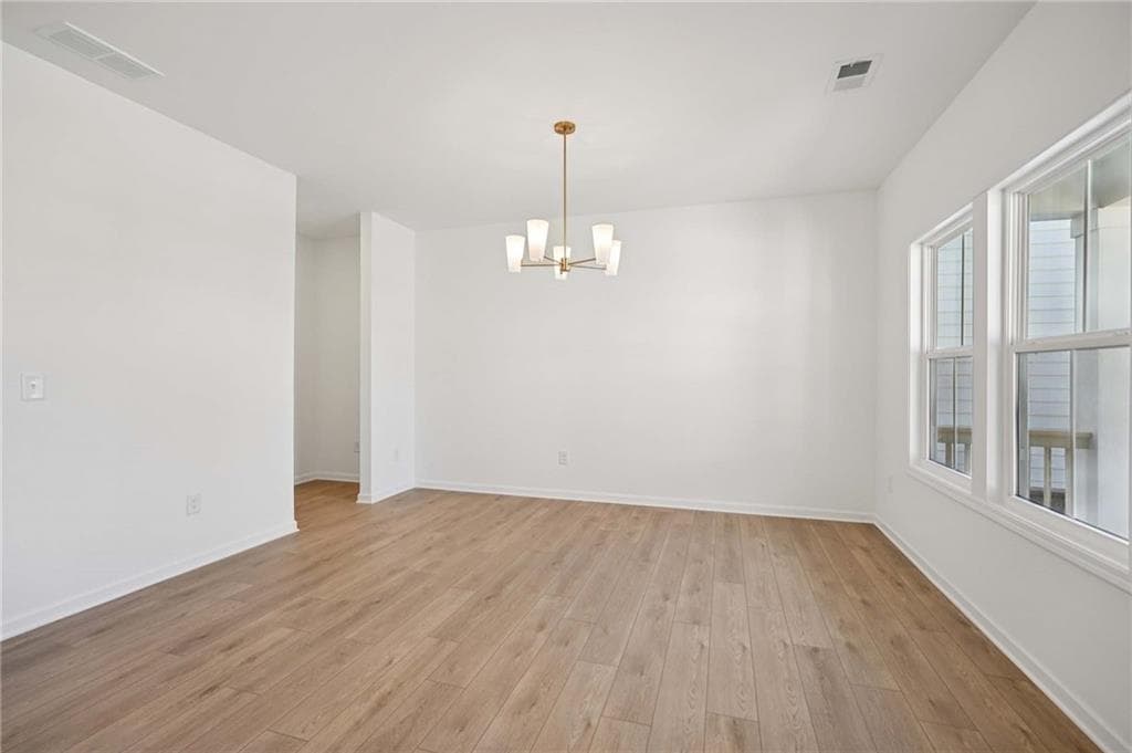 5 bedroom, 4 bathroom, 3,214 sq ft single family residence for sale at 6245 Kismet Road, Buford, GA 30518 — photo 3