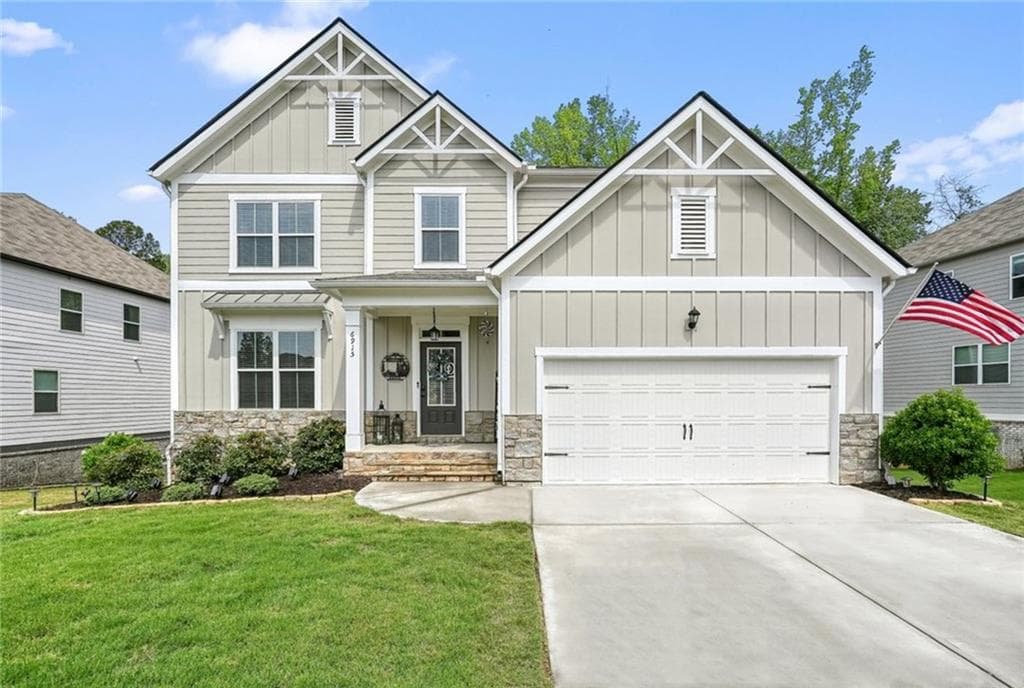 4 bedroom, 3 bathroom, 3,124 sq ft single family residence for sale at 6915 Rambling Vale, Cumming, GA 30028 — photo 1 of 63