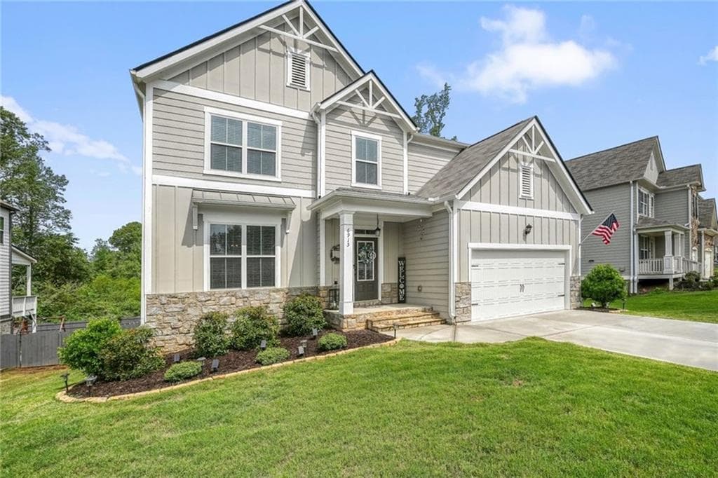 4 bedroom, 3 bathroom, 3,124 sq ft single family residence for sale at 6915 Rambling Vale, Cumming, GA 30028 — photo 2