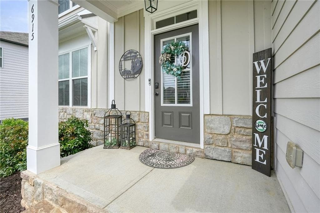 4 bedroom, 3 bathroom, 3,124 sq ft single family residence for sale at 6915 Rambling Vale, Cumming, GA 30028 — photo 3