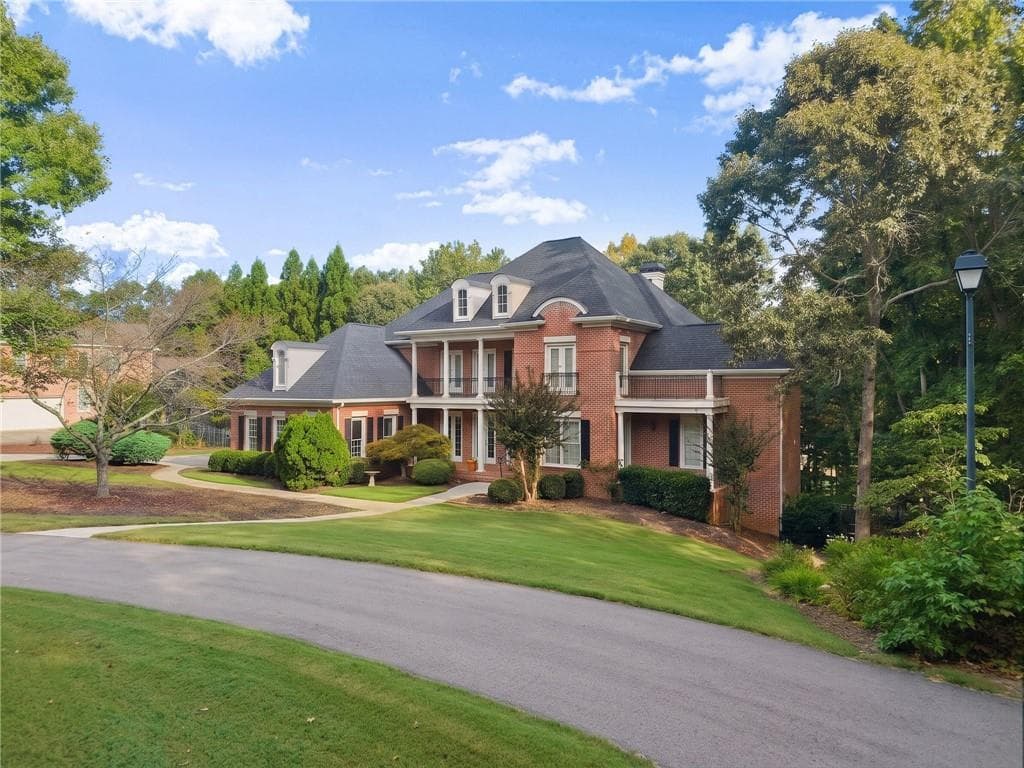 4 bedroom, 6 bathroom, 7,303 sq ft single family residence for sale at 2040 Tee Drive, Braselton, GA 30517