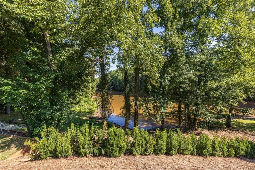 4 bedroom, 3 bathroom, 2,459 sq ft single family residence for sale at 577 Lantern Wood Drive, Scottdale, GA 30079 — photo 8