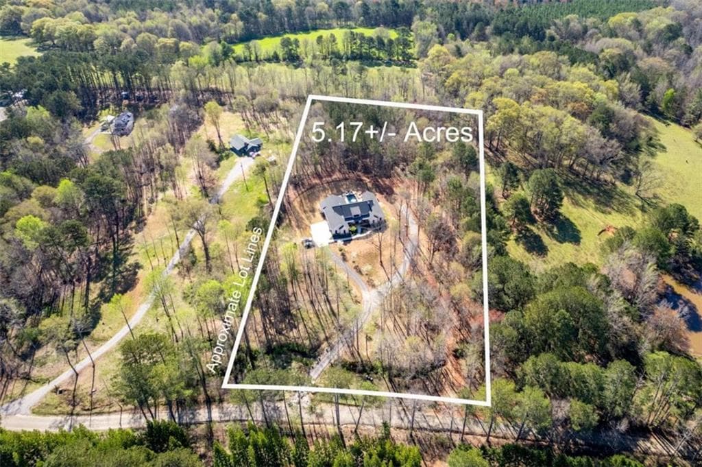 4 bedroom, 4 bathroom, 3,451 sq ft single family residence for sale at 1953 Barton Bridge Road, Monroe, GA 30655 — photo 2