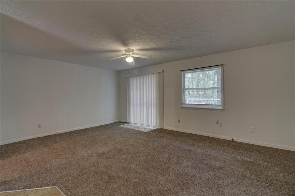 3 bedroom, 2 bathroom, 1,456 sq ft single family residence for sale at 4749 Lost Colony Court, Stone Mountain, GA 30088 — photo 4