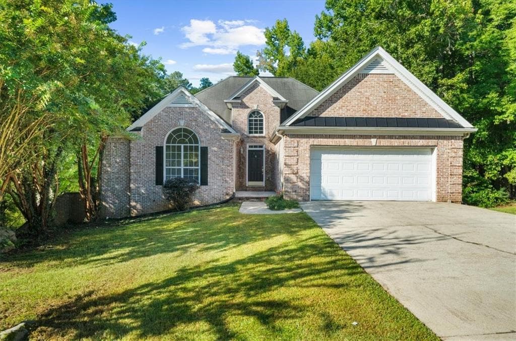6 bedroom, 4 bathroom, 3,700 sq ft single family residence for sale at 10017 Harmon Springs Drive, Villa Rica, GA 30180 — photo 2