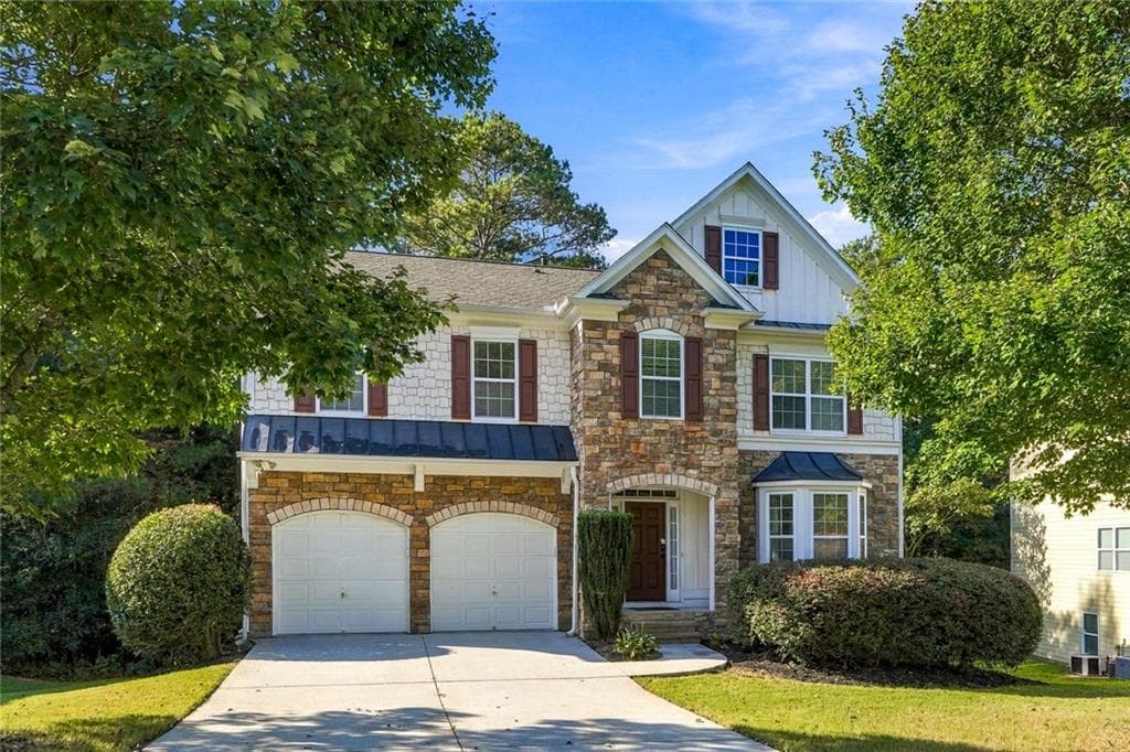 4 bedroom, 3 bathroom, 2,974 sq ft single family residence for sale at 2017 Preserve Creek Way, Loganville, GA 30052 — photo 2