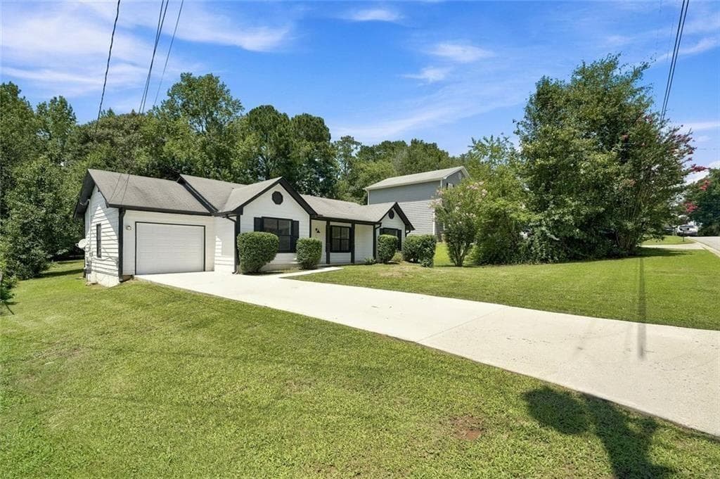 3 bedroom, 2 bathroom, 1,192 sq ft single family residence for sale at 1298 Winslow Drive, Jonesboro, GA 30238 — photo 2