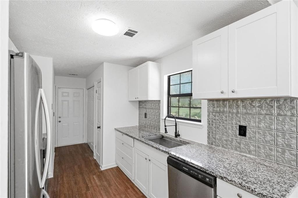3 bedroom, 2 bathroom, 1,192 sq ft single family residence for sale at 1298 Winslow Drive, Jonesboro, GA 30238 — photo 9