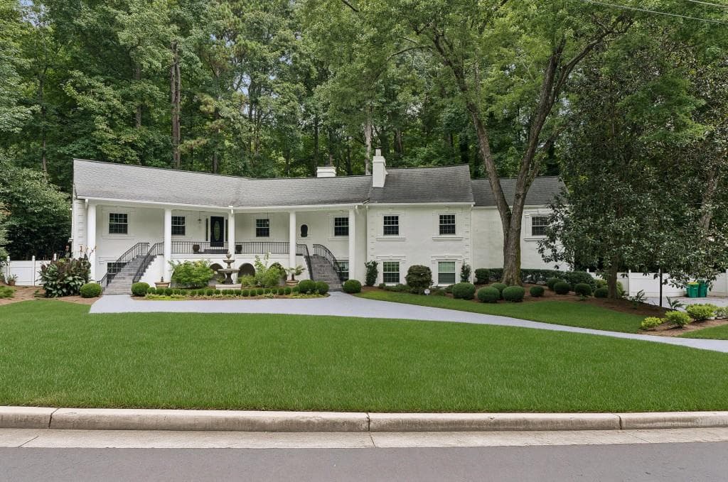 6 bedroom, 5 bathroom, 5,773 sq ft single family residence for sale at 585 Idlewood Drive, Sandy Springs, GA 30327