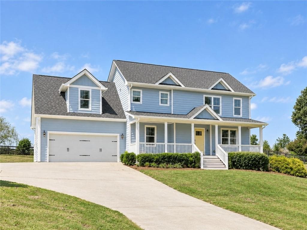 4 bedroom, 3 bathroom, 2,476 sq ft home for sale at 7955 Little Mill Road, Cumming, GA