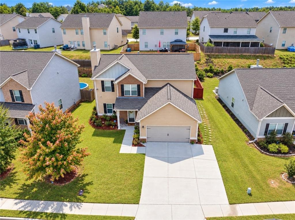 4 bedroom, 3 bathroom, 2,357 sq ft single family residence for sale at 4194 Potomac Walk Court, Loganville, GA 30052 — photo 4