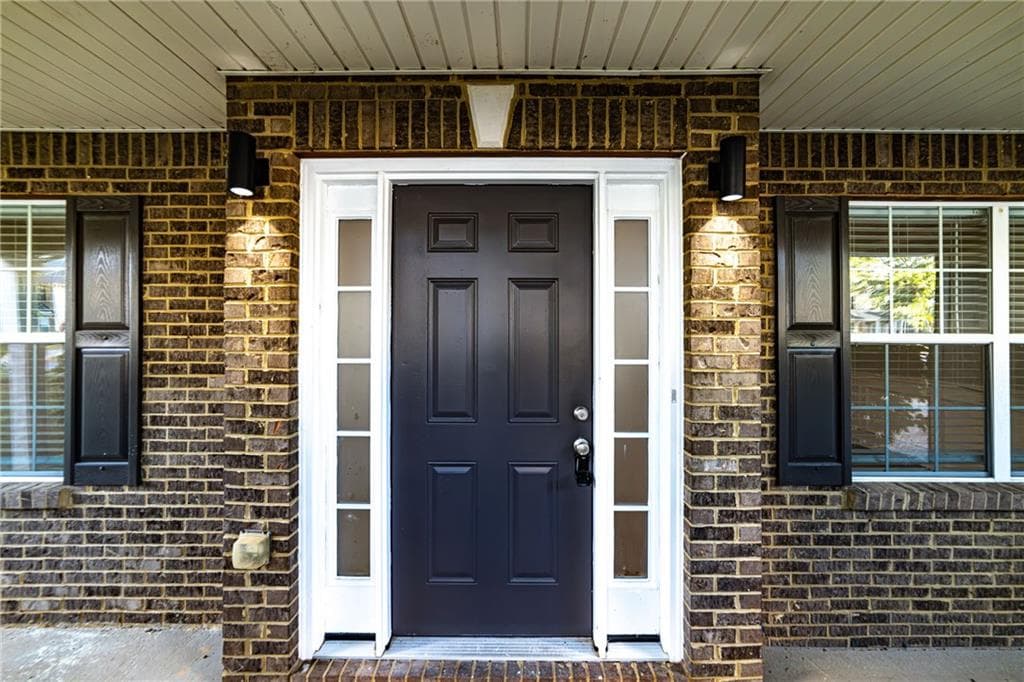 4 bedroom, 3 bathroom, 2,790 sq ft single family residence for sale at 596 Vaughan Drive, Hampton, GA 30228 — photo 2