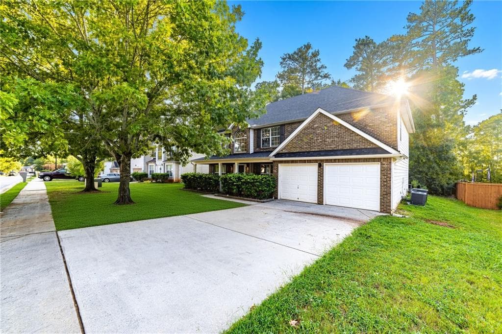4 bedroom, 3 bathroom, 2,790 sq ft single family residence for sale at 596 Vaughan Drive, Hampton, GA 30228 — photo 3
