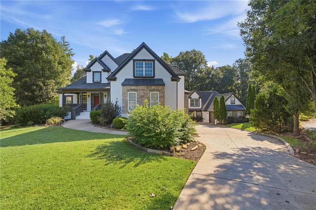 6 bedroom, 11 bathroom, 9,647 sq ft single family residence for sale at 704 Summerbrooke Court, Mcdonough, GA 30253 — photo 2