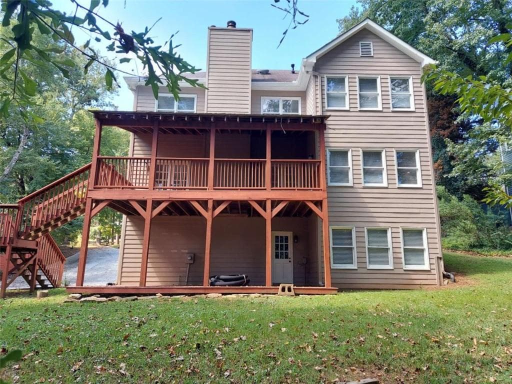4 bedroom, 4 bathroom, 3,016 sq ft single family residence for sale at 3188 Country Club Court, Kennesaw, GA 30144 — photo 2