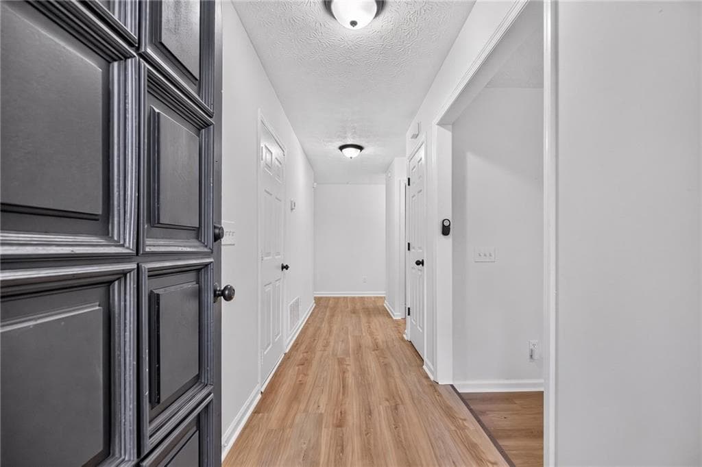 3 bedroom, 2 bathroom, 1,334 sq ft single family residence for sale at 1555 Burnstone Drive, Stone Mountain, GA 30088 — photo 3