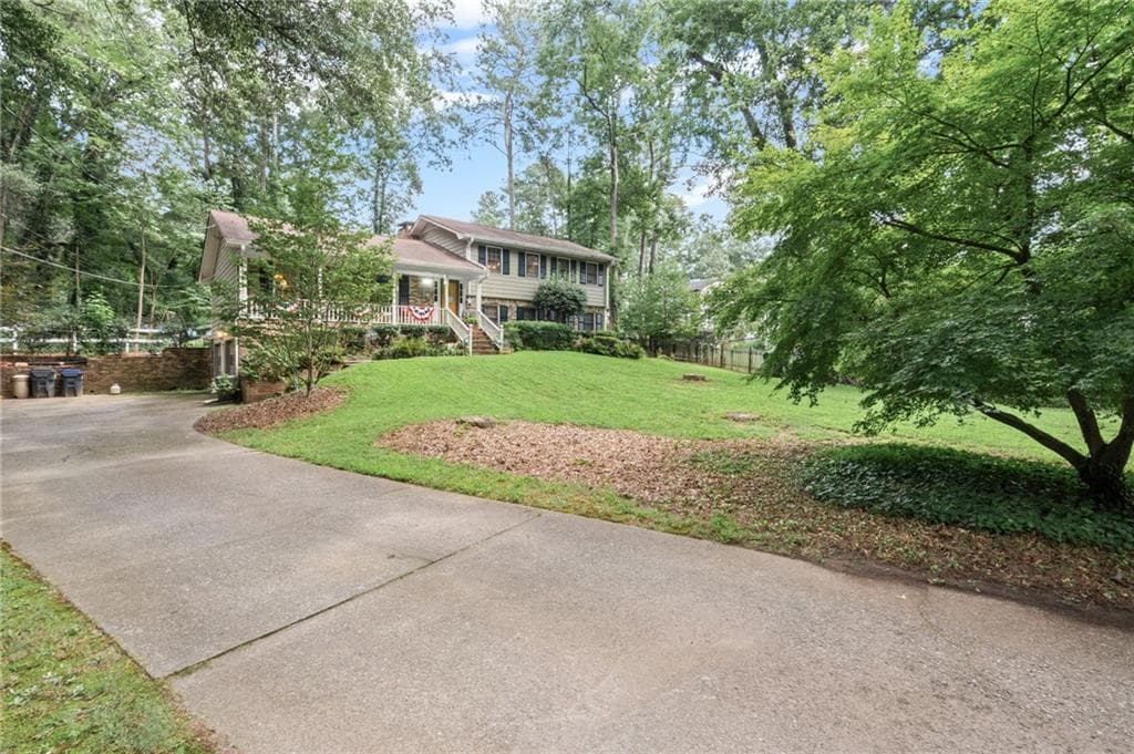4 bedroom, 3 bathroom, 2,240 sq ft single family residence for sale at 2191 Brookfield Circle, Lawrenceville, GA 30043 — photo 2
