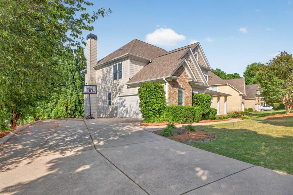 6 bedroom, 5 bathroom, 4,373 sq ft single family residence for sale at 1617 Trilogy Park Drive, Hoschton, GA 30548 — photo 5