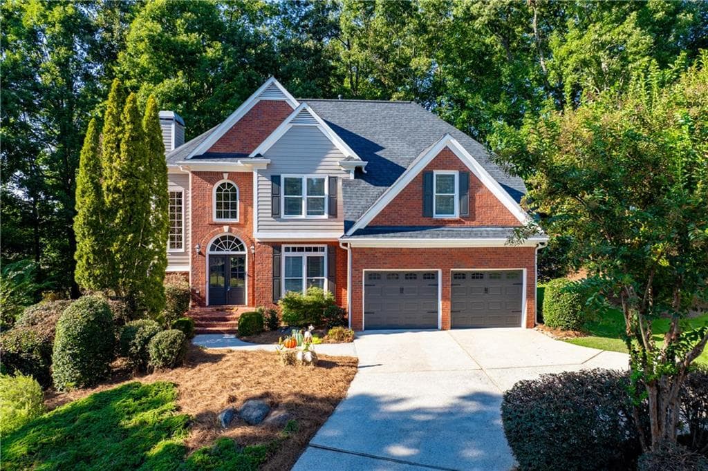 4 bedroom, 3 bathroom, 3,280 sq ft single family residence for sale at 1485 Fair Point Pass, Suwanee, GA 30024 — photo 1 of 48