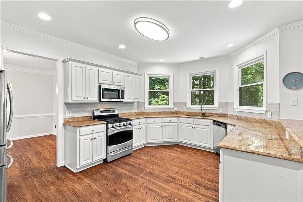 7 bedroom, 4 bathroom, 5,004 sq ft single family residence for sale at 1073 Hopedale Lane, Lawrenceville, GA 30043 — photo 7