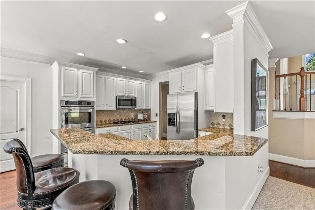 6 bedroom, 3 bathroom, 4,783 sq ft single family residence for sale at 4024 Herron Trail, Atlanta, GA 30349 — photo 6